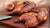 Clucker-Dusted Brick Chicken with Peach Glaze & BBQ Peaches